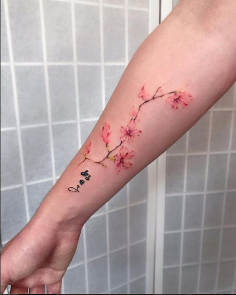 feminine cherry blossom tattoo