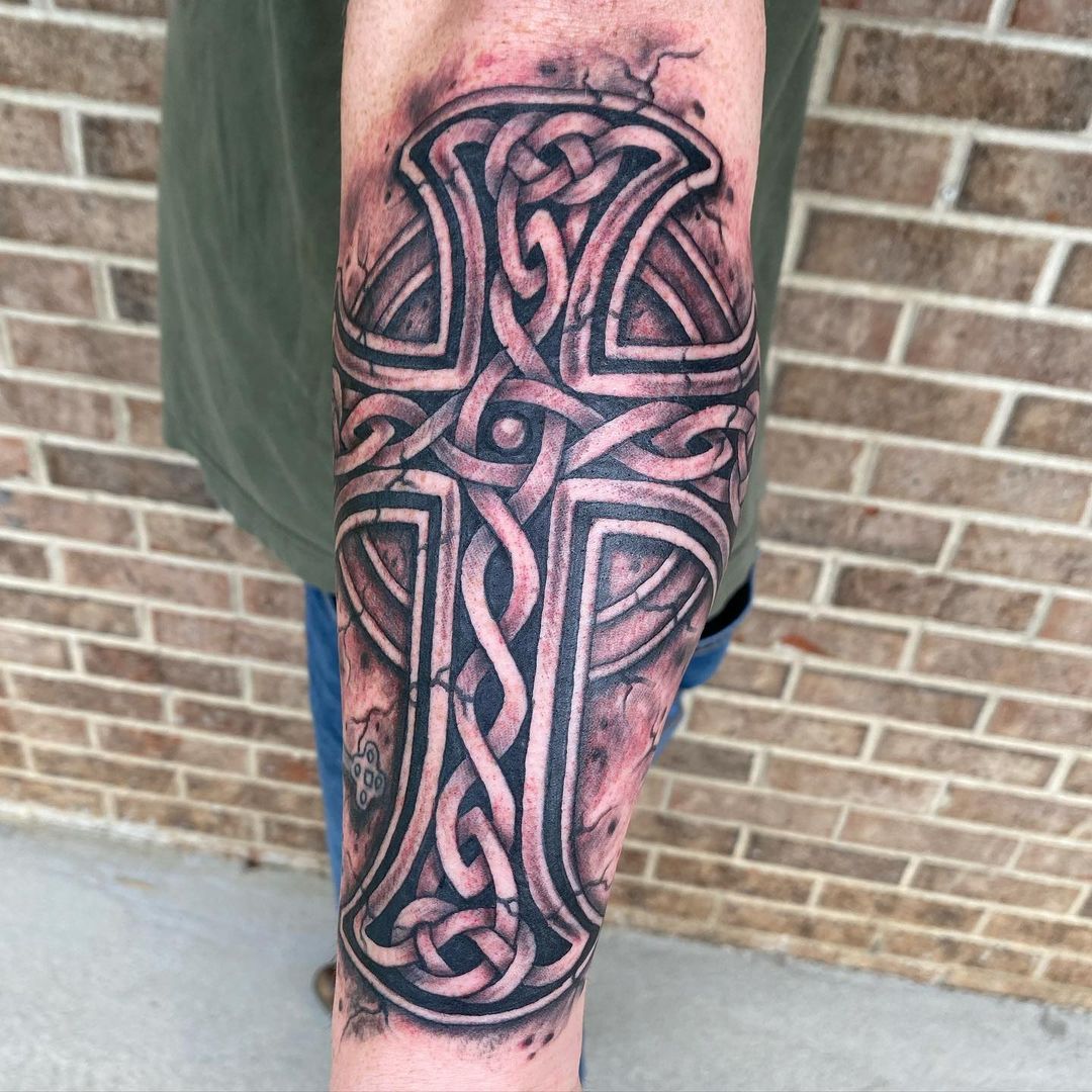 cross tattoo on hands