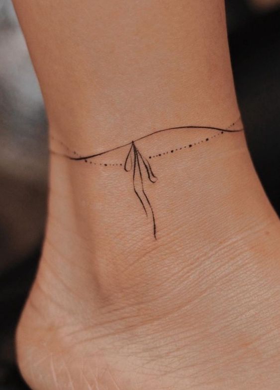 Girly foot tattoo