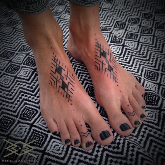 Girly foot tattoo