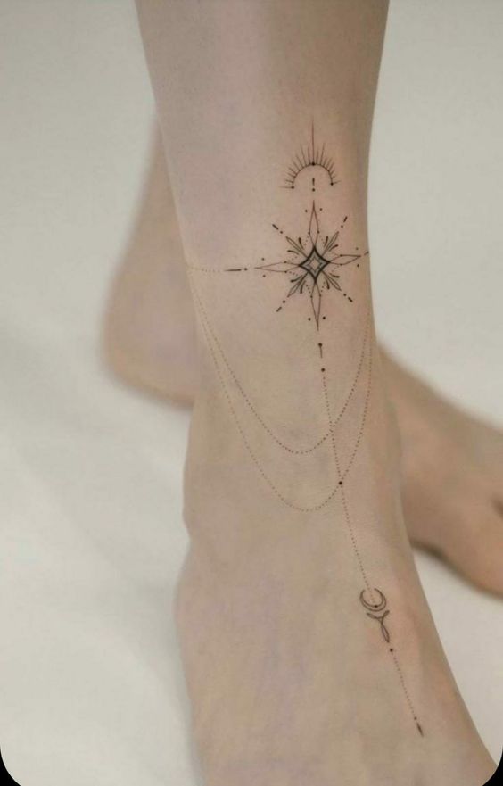 Girly foot tattoo