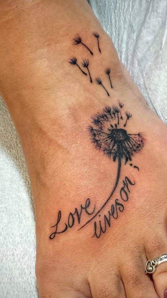 Girly foot tattoo