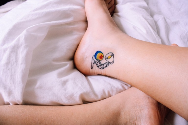 Girly foot tattoo