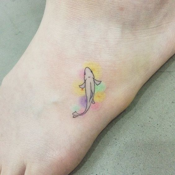 Girly foot tattoo