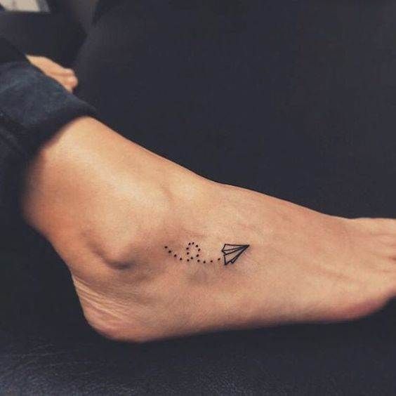 Girly foot tattoo