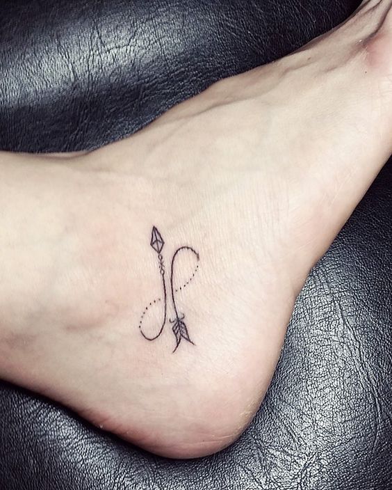 Girly foot tattoo