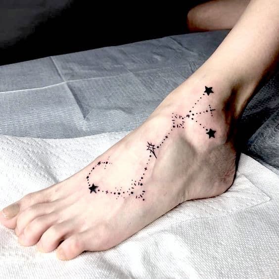 Girly foot tattoo