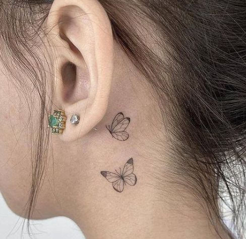 womens throat tattoos