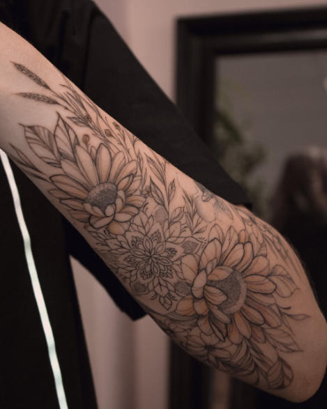 meaningful sunflower tattoo