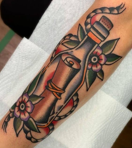 Tattoos with a Bottle with a Note
