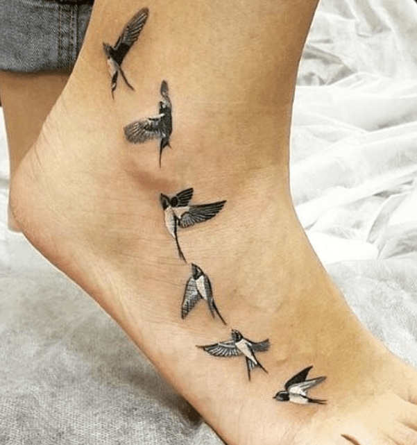 Birds in foot tattoo design