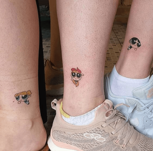 Cartoony friend tattoos