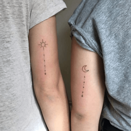 Space-inspired best friend tattoos