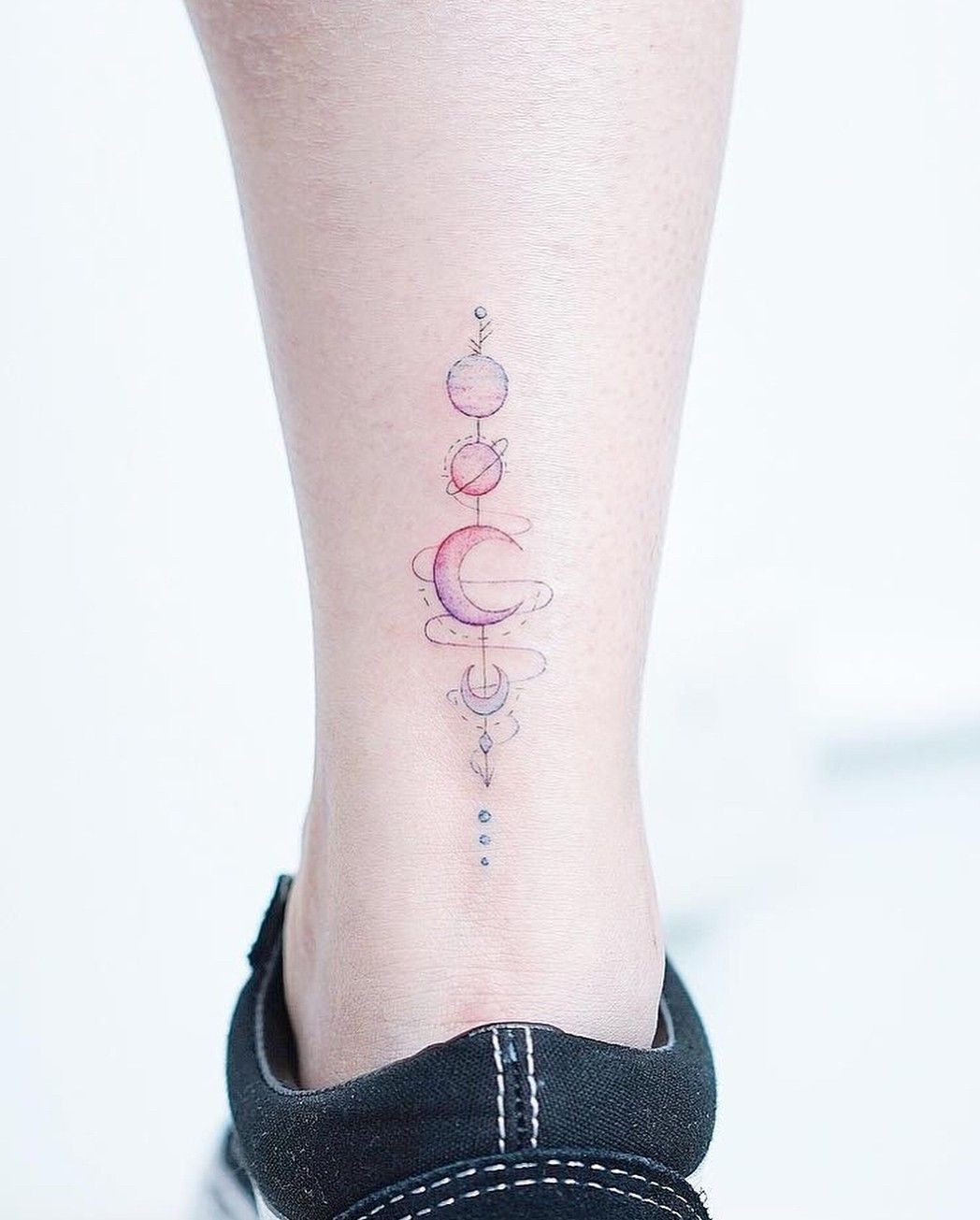 Ankle moon tattoo