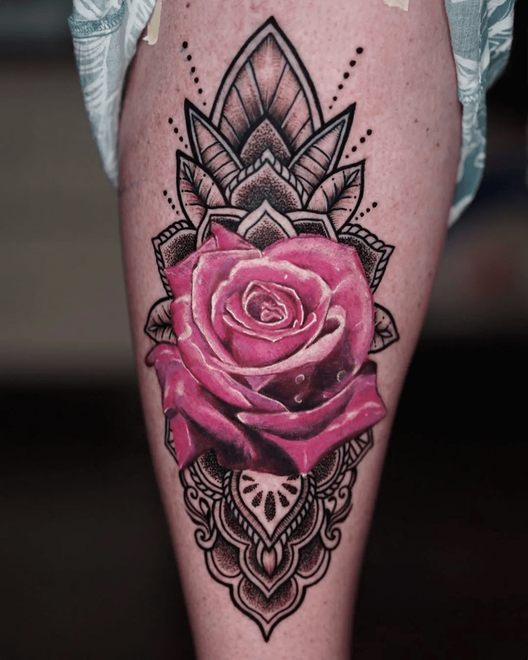 Pink rose tattoo