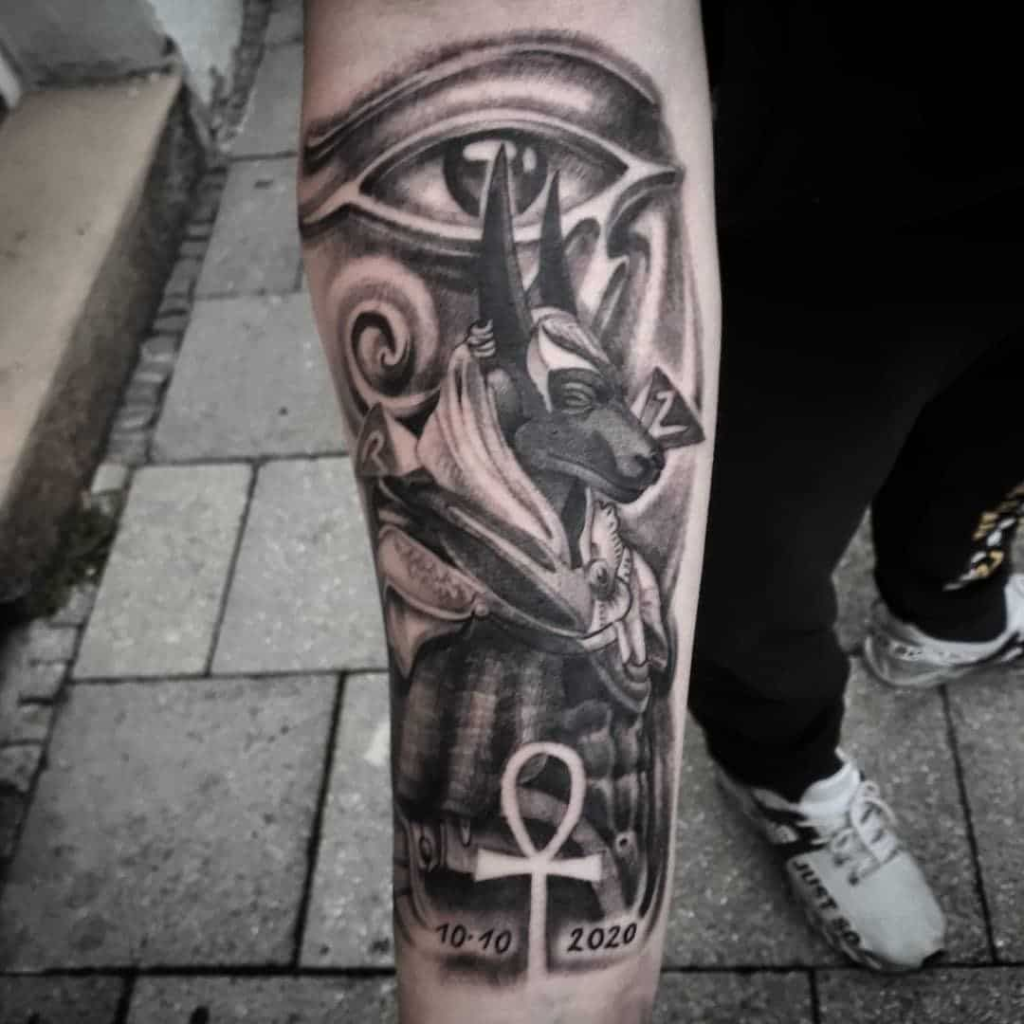 Tattoo of Anubis with an Egyptian eye 