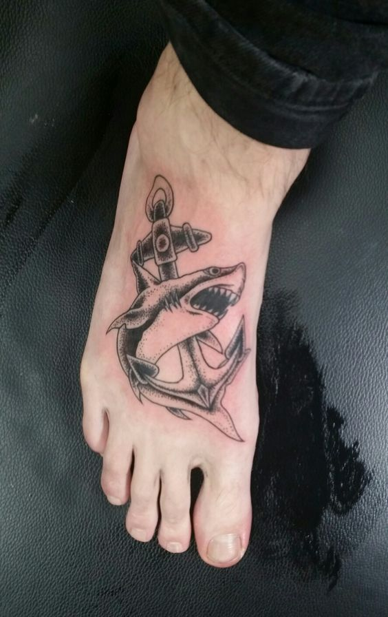 Example of a shark tattoo with an anchor