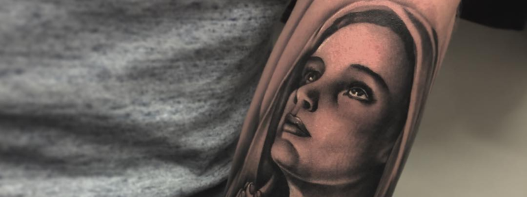 Virgin Mary tattoo