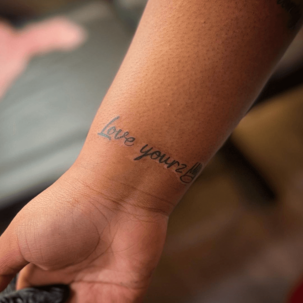 How Did “Love Yourz” by J. Cole Become a Tattoo Trend?