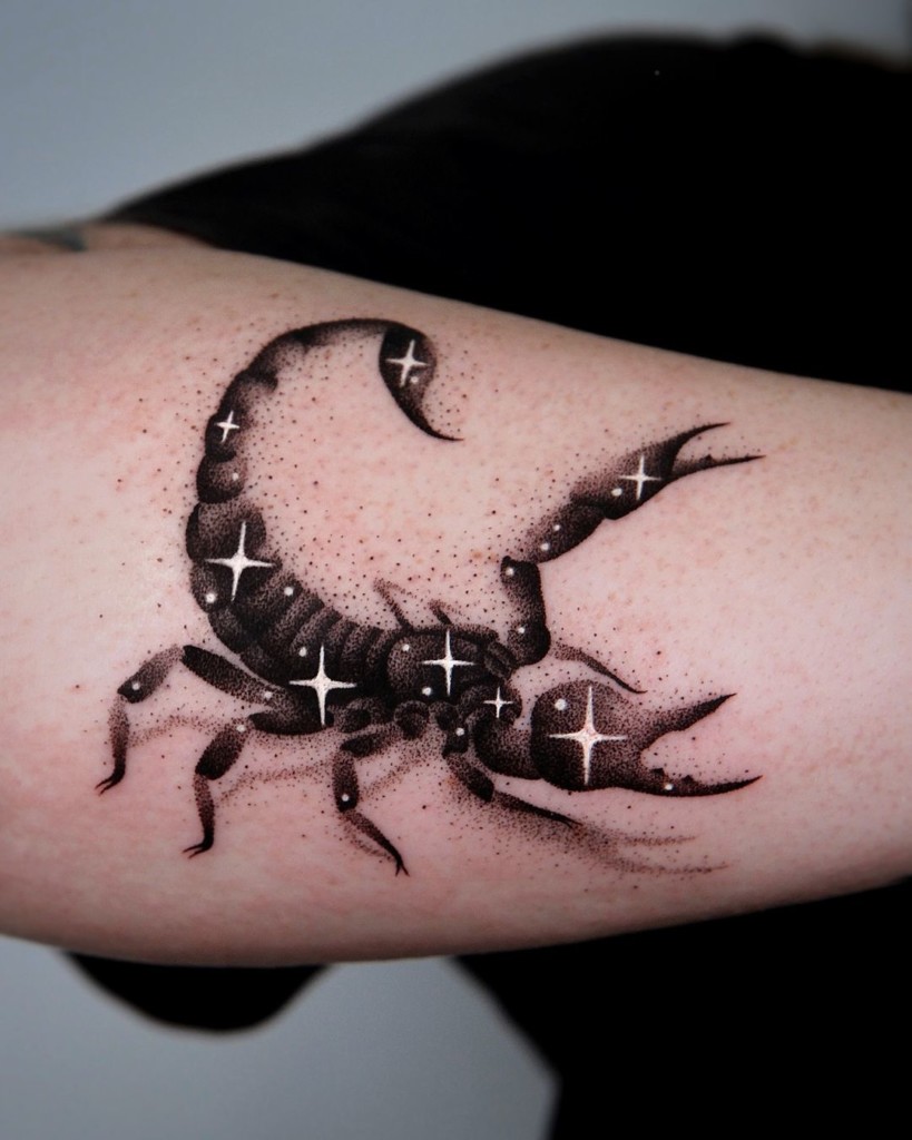 You can go for a tattoo that references the star positions in the Scorpio constellation. It can be a scorpion itself or just its schematic representation.