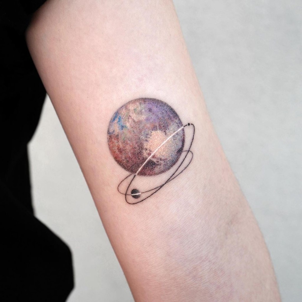 Pluto is the ruling planet for Scorpios, which is responsible for transformation and destruction. Of course, you can make it a central theme of your tattoo.