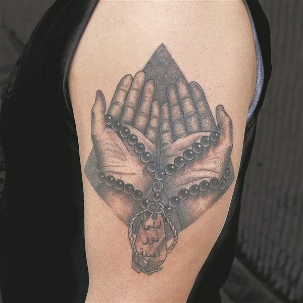 Praying Hands tattoo