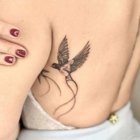 Swallow tattoo