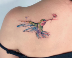 Tattoo from our artist Ali small cherry blossom tattoo