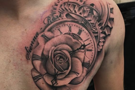 Chest clock birth tattoo