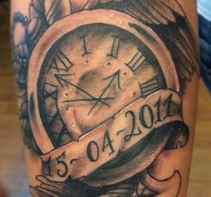 clock with child’s birth time tattoo