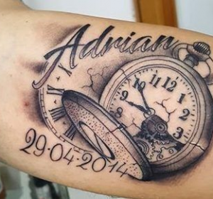 clock with child’s birth time tattoo