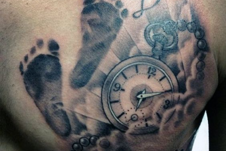 Chest clock birth tattoo