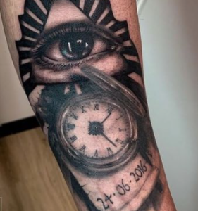 eye birth clock tattoo