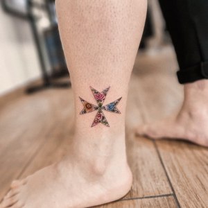 Maltese cross tattoo