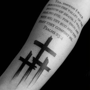 Modern cross tattoo
