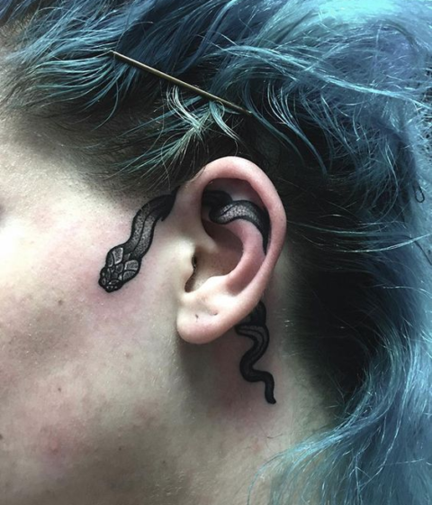 snake sideburns tattoos