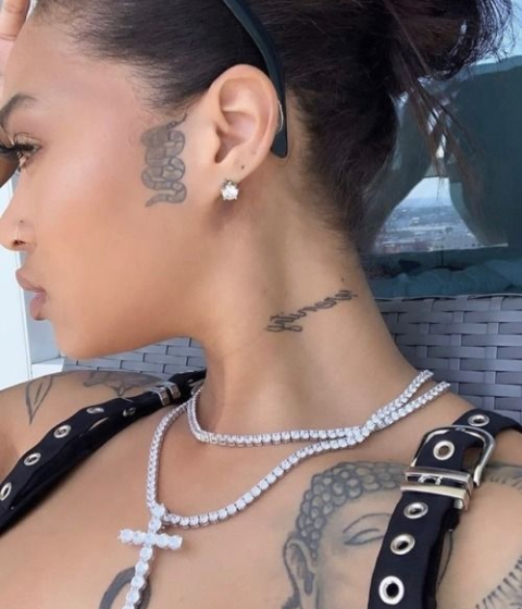 snake sideburns tattoos