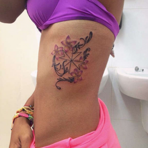 Maltese cross tattoo