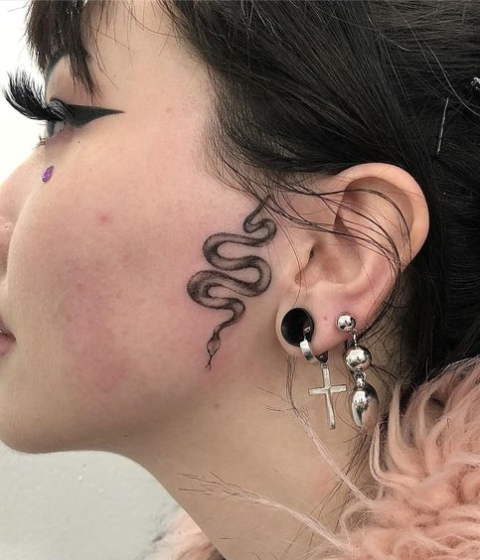 snake sideburns tattoos