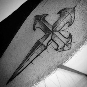 Modern cross tattoo