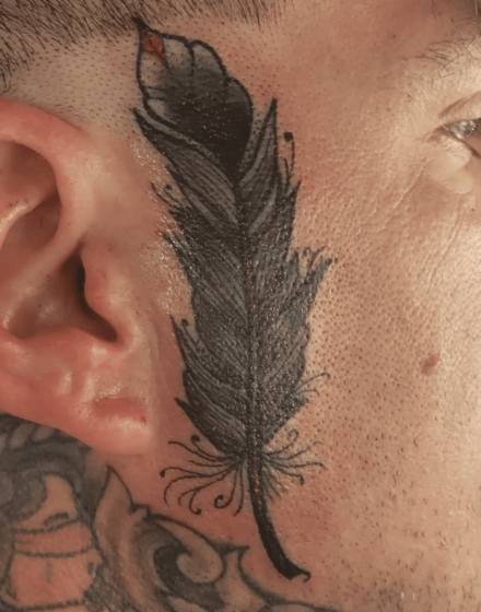 feather sideburns tattoos