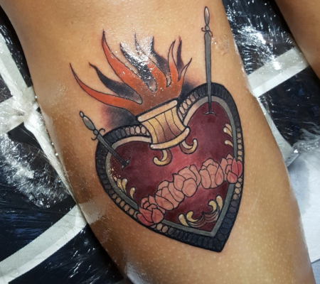 Traditional heart with flames tattoo