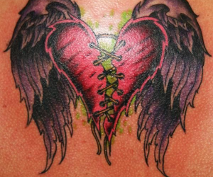 Heart with wings tattoo