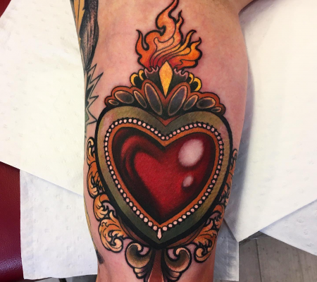 Traditional heart with flames tattoo