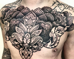 The mandala breast tattoo