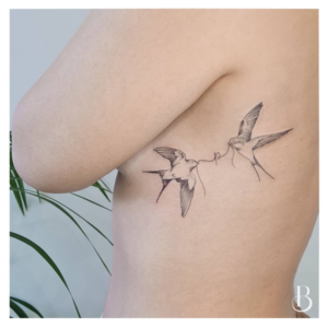 Two birds tattoo