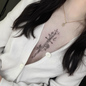 Sword flowered tattoo