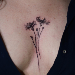 Thin flowers tattoo