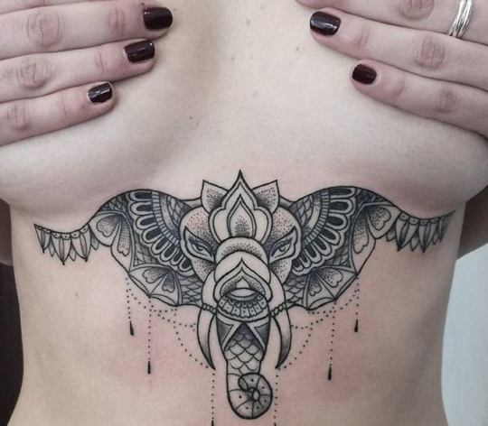 tattoo_on_chest animal tattoo