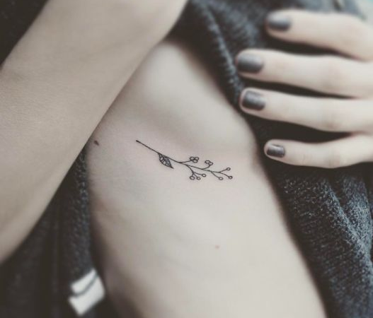 tattoo_on_ribs tattoo flowers